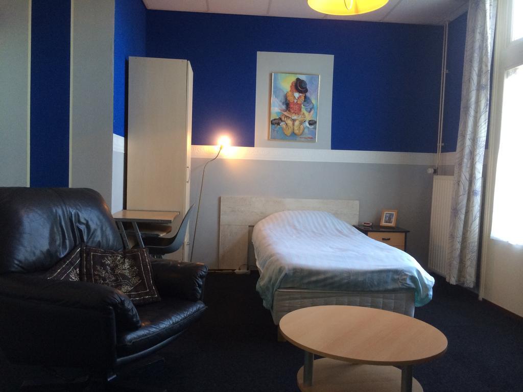Hotel De Blauwe Vogel Bergen op Zoom Rom bilde
