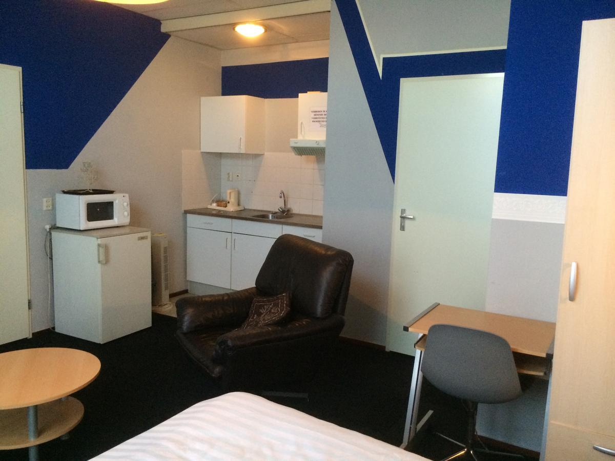 Hotel De Blauwe Vogel Bergen op Zoom Rom bilde
